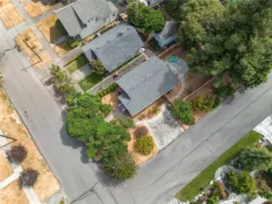 The bird's-eye view showcases the easy-to-maintain landscaping, extensive flagstone pathways and large backyard patio. Even the off-street parking has had a classy refresh!