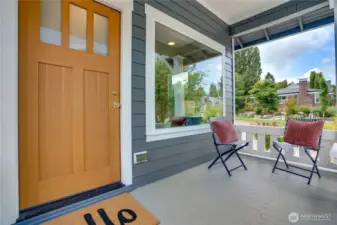 Say hello in style—this welcoming porch, brand-new front door, and statement picture window set the tone for what’s to look forward to inside.