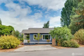 Enjoy the convenience of private parking for two, nestled among the trees and bushes in your beautifully landscaped yard and just steps from your front and back porch.