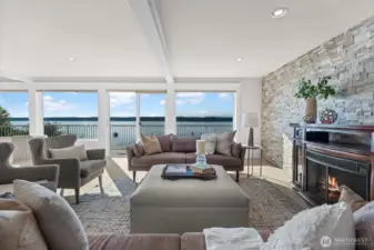A spacious living room designed for entertaining, sunset views, game nights, and holiday gatherings. Full Ledgestone wall!