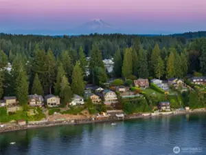 While Mount Rainier lies behind, the full Olympic Mountain range unfolds before you at 4026 Forest Beach Drive.