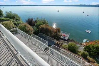 Top-floor deck off the primary bedroom offers unmatched panoramic views.