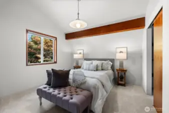 A large upstairs bedroom with oversized closets, perfect for comfort and organization.