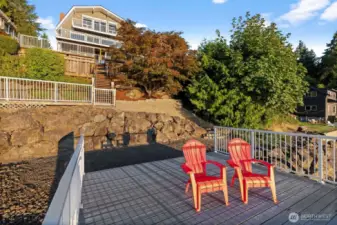 Over-water deck for lounging or entertaining, with easy access to the water for a refreshing swim.