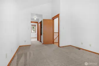2nd floor primary bedroom looking toward closet and master bath.