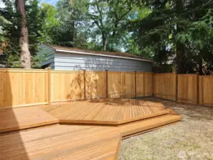 Custom deck with new fence.