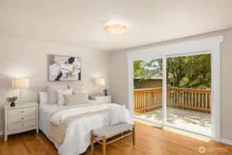 Primary bedroom with gorgeous views of the lake.