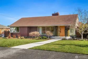 Welcome to this thoughtfully updated mid-century modern home with a perfect blend of timeless character and high-quality upgrades.