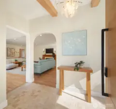 Front entry opening to light-filled living space.