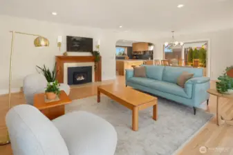 Living space flowing seamlessly into dining & kitchen area.