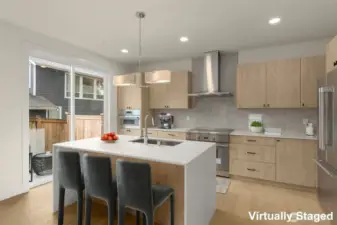 Quartz waterfall island and countertops.