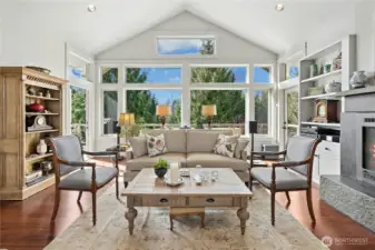 A beautiful wall of windows fills the house with natural light.