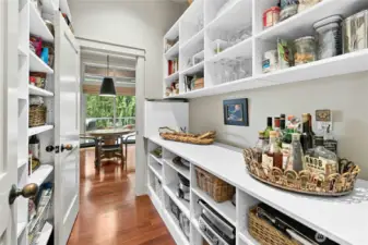 Everyone loves a good pantry and this is something else!  This pantry connects to the eating area off of the kitchen to the hallway to the laundry room.