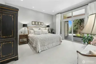 A very spacious Primary Bedroom has doors to a private patio and a beautiful ensuite bathroom and large walk in closet.