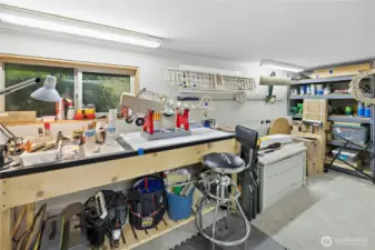 A portion of the basement is finished and has heat.  can be used as a garden room or an extra work space.