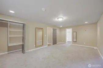 Primary suite offers a peaceful space with plenty of room to relax.