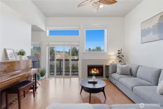 The main floor is light, bright, and airy with high ceilings, a fresh coat of interior paint, and beautiful wood floors!