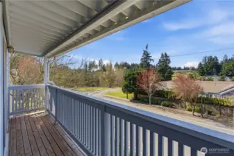 The back balcony extends nearly the full length of the townhome with plenty of space for potted plants and a couple of chairs to enjoy the evening sunset