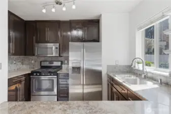 The beautiful kitchen in combination with the pantry closet offers plenty of storage space.