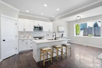 White Shaker Cabinets with Huge Island