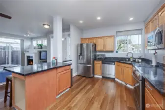 Granite counters with eating space at bar.