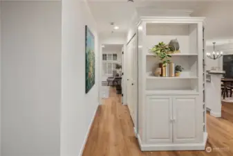 the corridor to the main bedroom with its own private bath and walk in closet