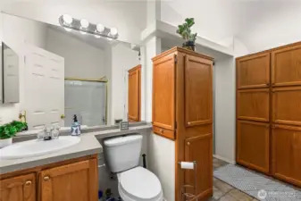Main bath (full bathtub), lots of storage.