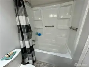 Main Bath With Newer Shower Surround & Brand New Toilet
