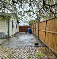 Space On E side Of House For RV, Boat, Etc. RV Hookups Already In!