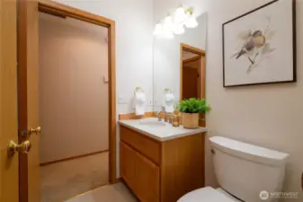 Well appointed ¾ bath on the main level provides a convenient option for guests or multigenerational living. Access is through the main living area AND the main floor den/office-possible 5th bedroom.
