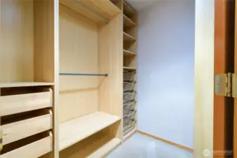 This walk-in closet isn't just about storage; it's about creating an organized oasis that simplifies your routine and makes getting ready a joy.
