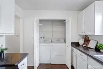 Washer and Dryer closet conveniently located at the heart of the home.