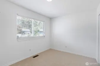 Bedroom #2 with all new paint and carpet.