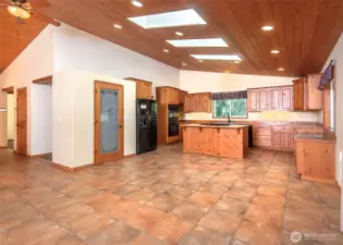 Open island kitchen with a pantry.