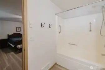 Primary bath w/view of primary bedroom.