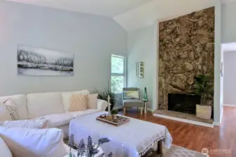 How about this fabulous stone wood-burning fireplace to make things cozy?