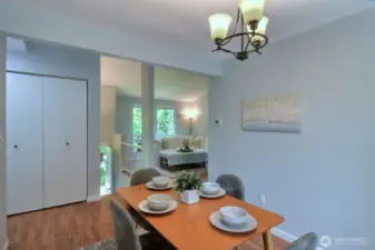 The dining area connects the kitchen to the living room, making the whole area flow nicely together.