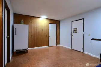 This flex room is perfect for any hobbies or storage needs you may have!  The door on the right opens to the garage.  The door straight ahead is to a storage closet.