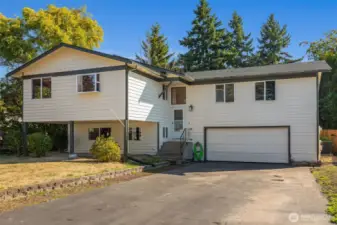 1968 split level. 2 car garage with shop area. Plenty of driveway parking too.