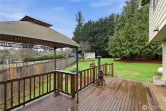 Back deck and view of south side of yard