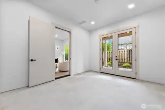 BIG Bonus room with French doors offers multiple options!