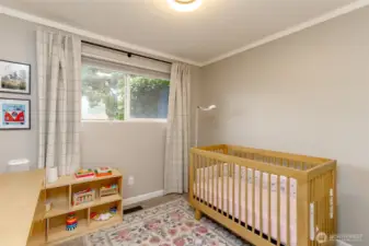 Updated bathroom features newer vanity and ceramic tiles