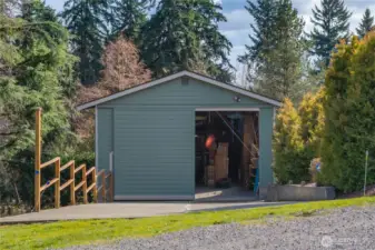 This view shows the "hidden" RV door open accommodating a 12' high entrance.