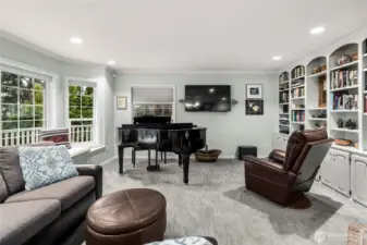 Three wall mount TVs stay with the house (living room, primary bedroom and lower level.)