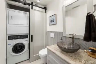 Main floor laundry and half bath.