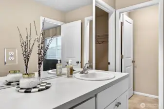 Primary bath - water closet and walk-in closet