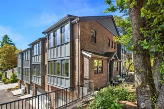 Welcome to McGraw Square — a boutique community of 57 thoughtfully crafted townhomes, each featuring its own spacious attached garage.