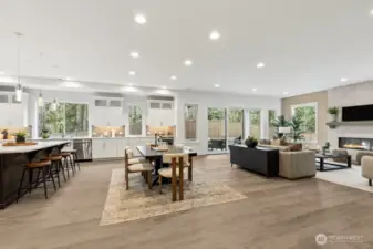 Step into the spacious great room with peaceful wooded outlooks from every window.