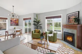 The main floor open floor plan flows from living to kitchen to dining to outside.