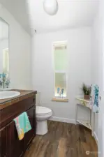 1/2 bath adjacent to great room & laundry.